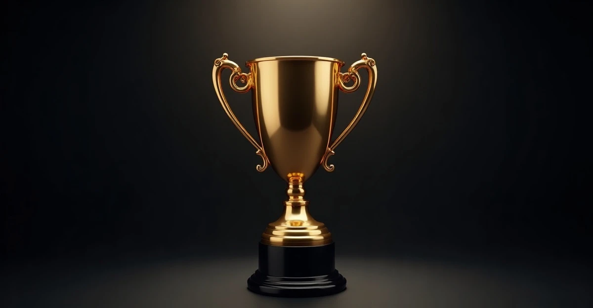A golden football trophy on a dark background, representing Colombia's league and cup competitions.