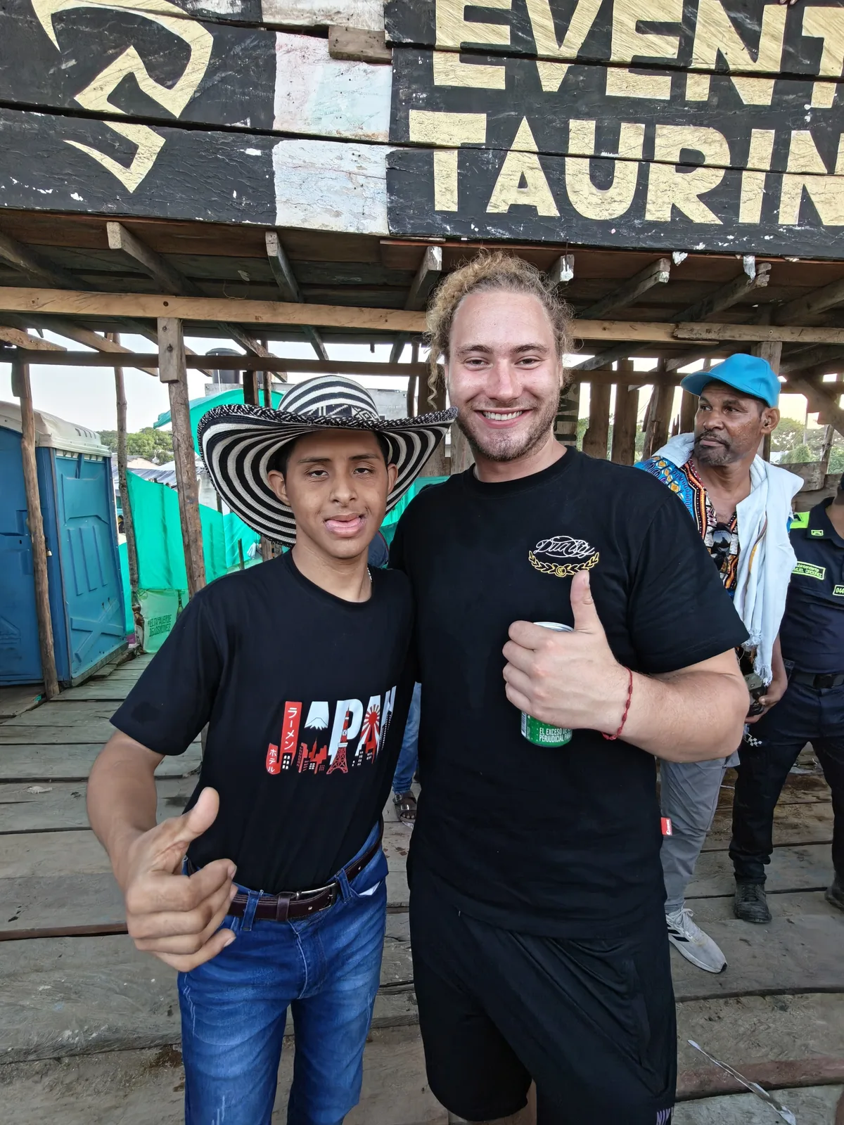 Locals made room and put a beer in my hand.